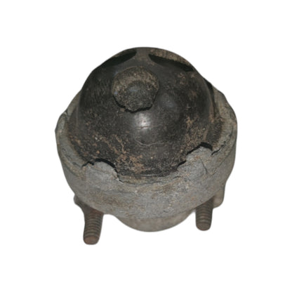 Vintage metal object with a spherical top and cylindrical base on a white background