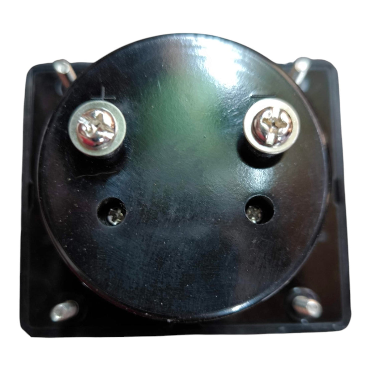 A black circular electrical component or terminal block with four mounting screws and two silver screw terminals on a white background.