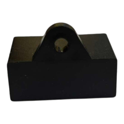 Black rubber block with a keyhole on a white background