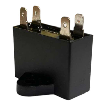 Black relay with metallic contacts on a white background