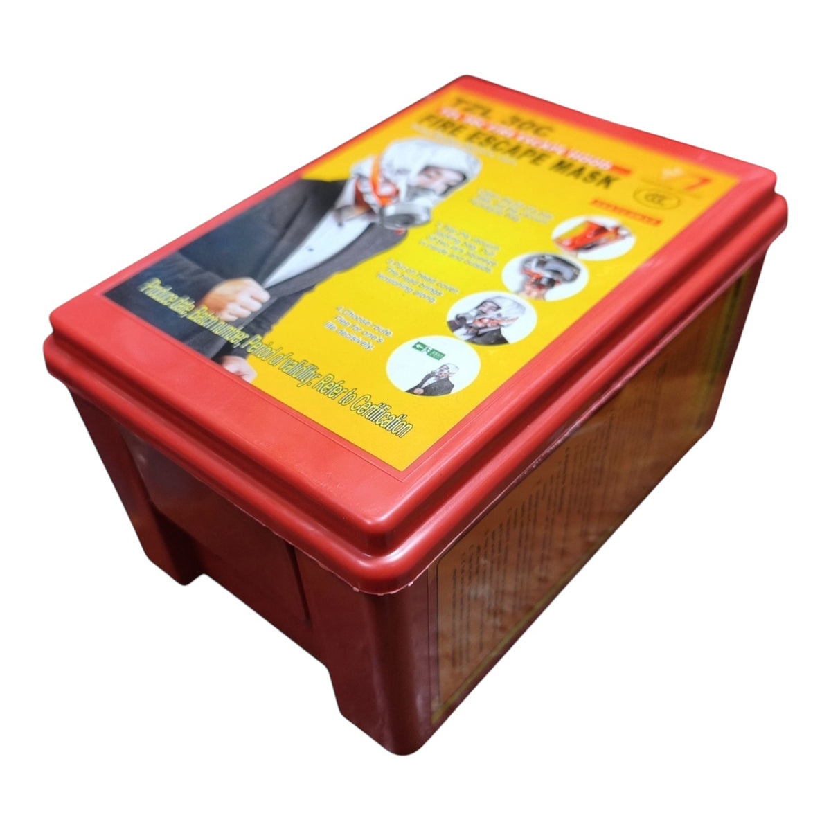 A red plastic emergency escape mask box with a yellow and black printed label on top, photographed on a plain white background.