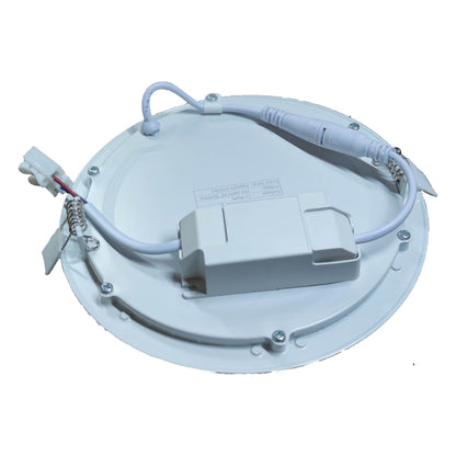 Round white LED light fixture with wiring on a white background
