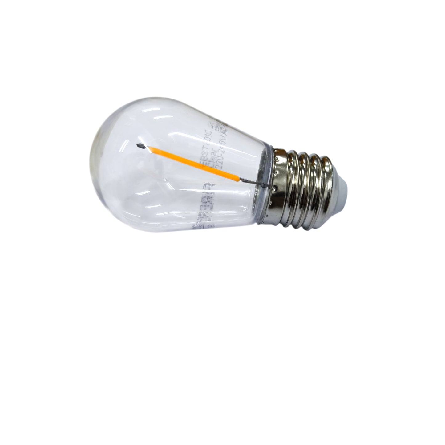Clear light bulb with visible filament on a white background