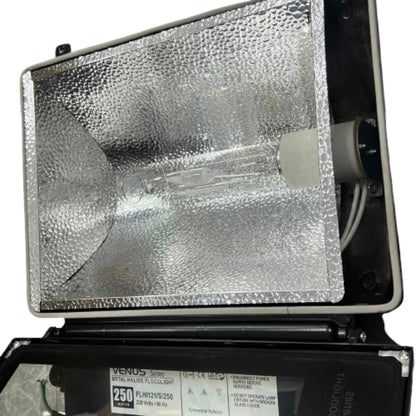 Fluorescent light fixture with reflective surface and visible brand name on a white background