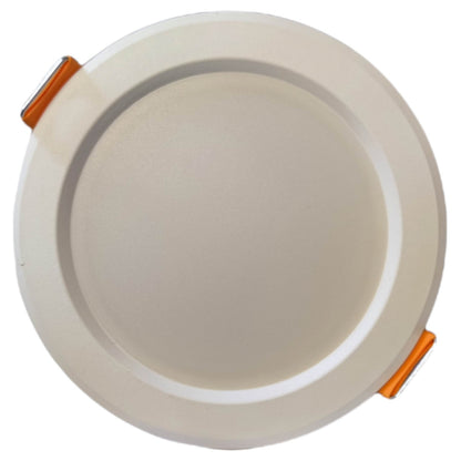 Round beige light fixture with orange accents on a white background