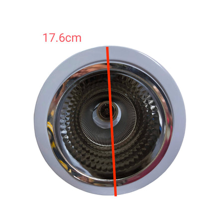 Chrome sink drain with measurement label on a white background
