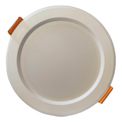 Round beige light fixture with orange accents on a white background
