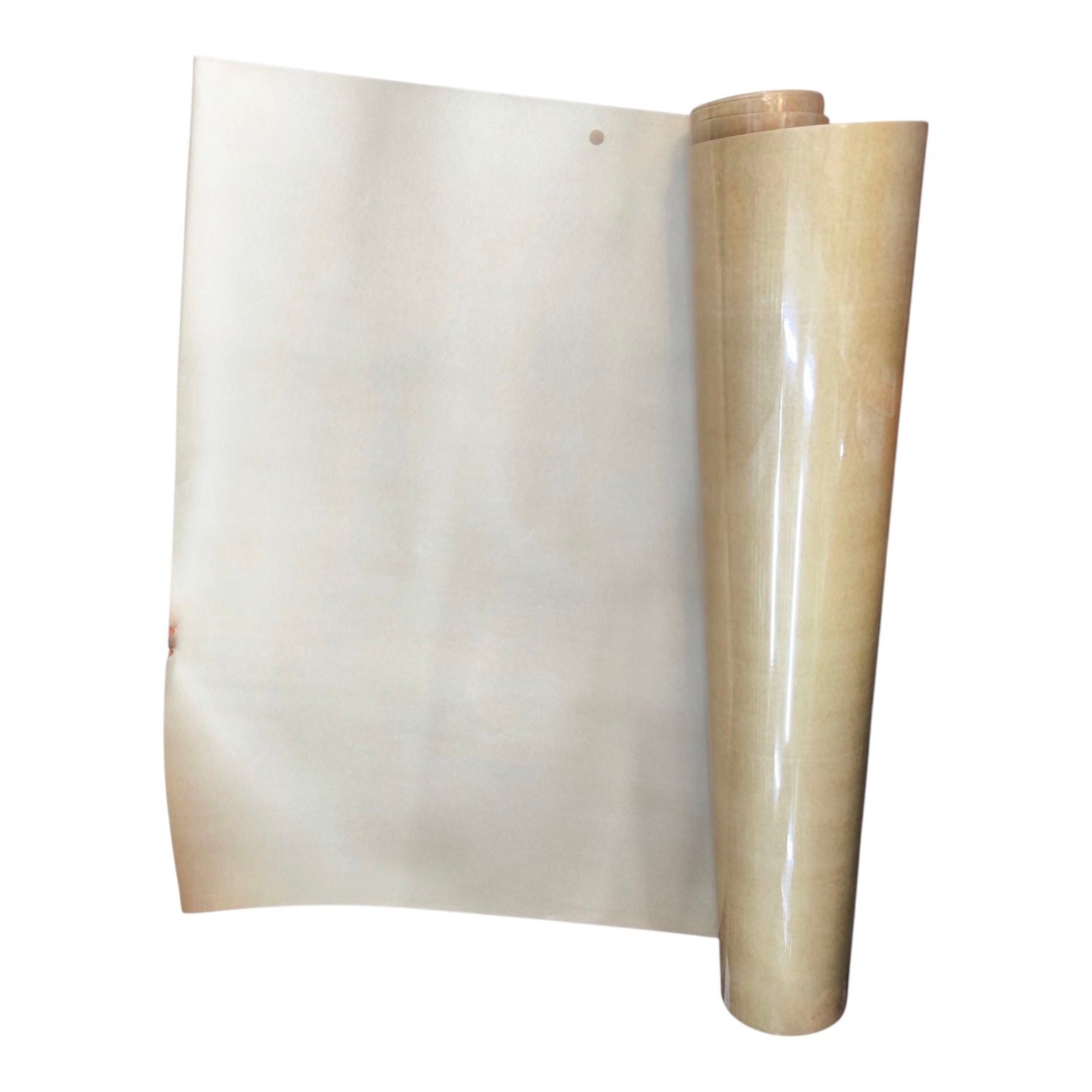 A roll of translucent beige adhesive film or vinyl sheet partially unrolled, showing its glossy, slightly wrinkled surface against a plain white background.
