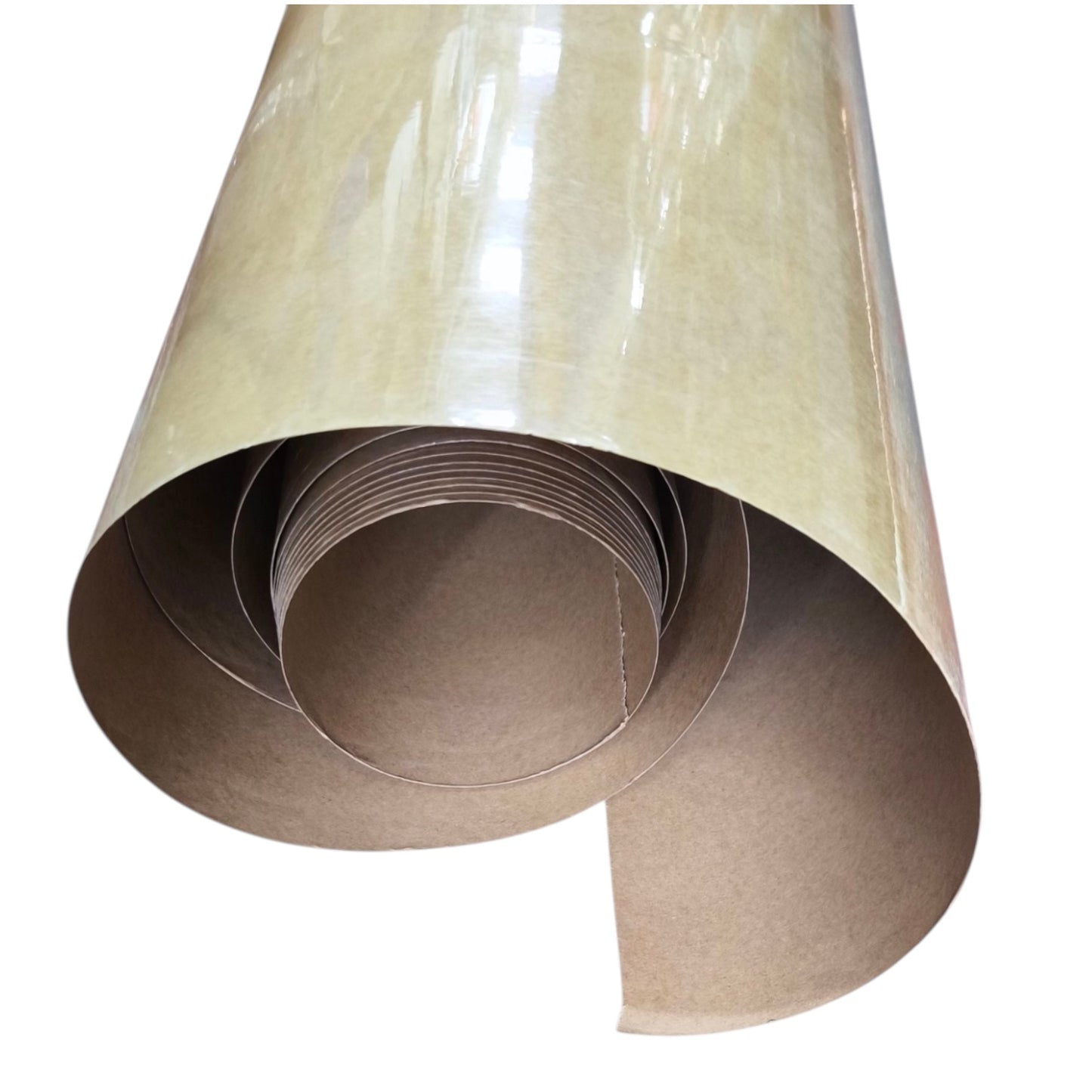 A roll of translucent kraft paper or cardboard sheet material, partially unrolled to show its brown interior and glossy outer surface, isolated on a white background.