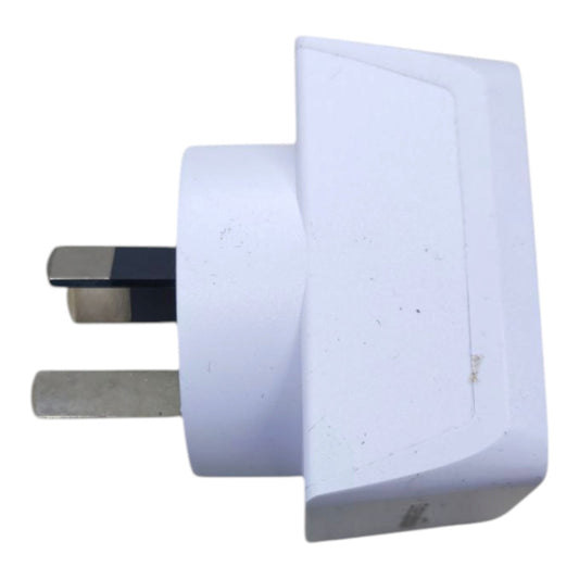 A white plastic UK three-pin wall plug adapter with metal pins, shown on a plain white background.
