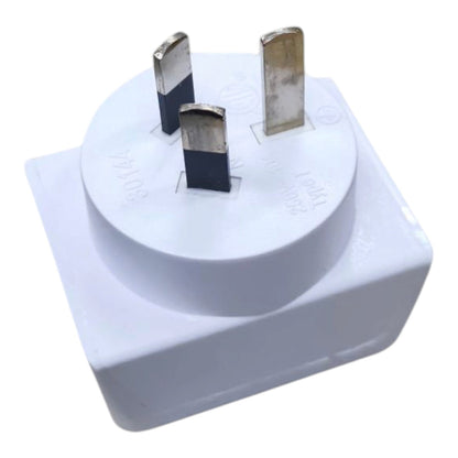 A white UK three-pin wall plug adapter with silver metal pins, shown on a plain white background.