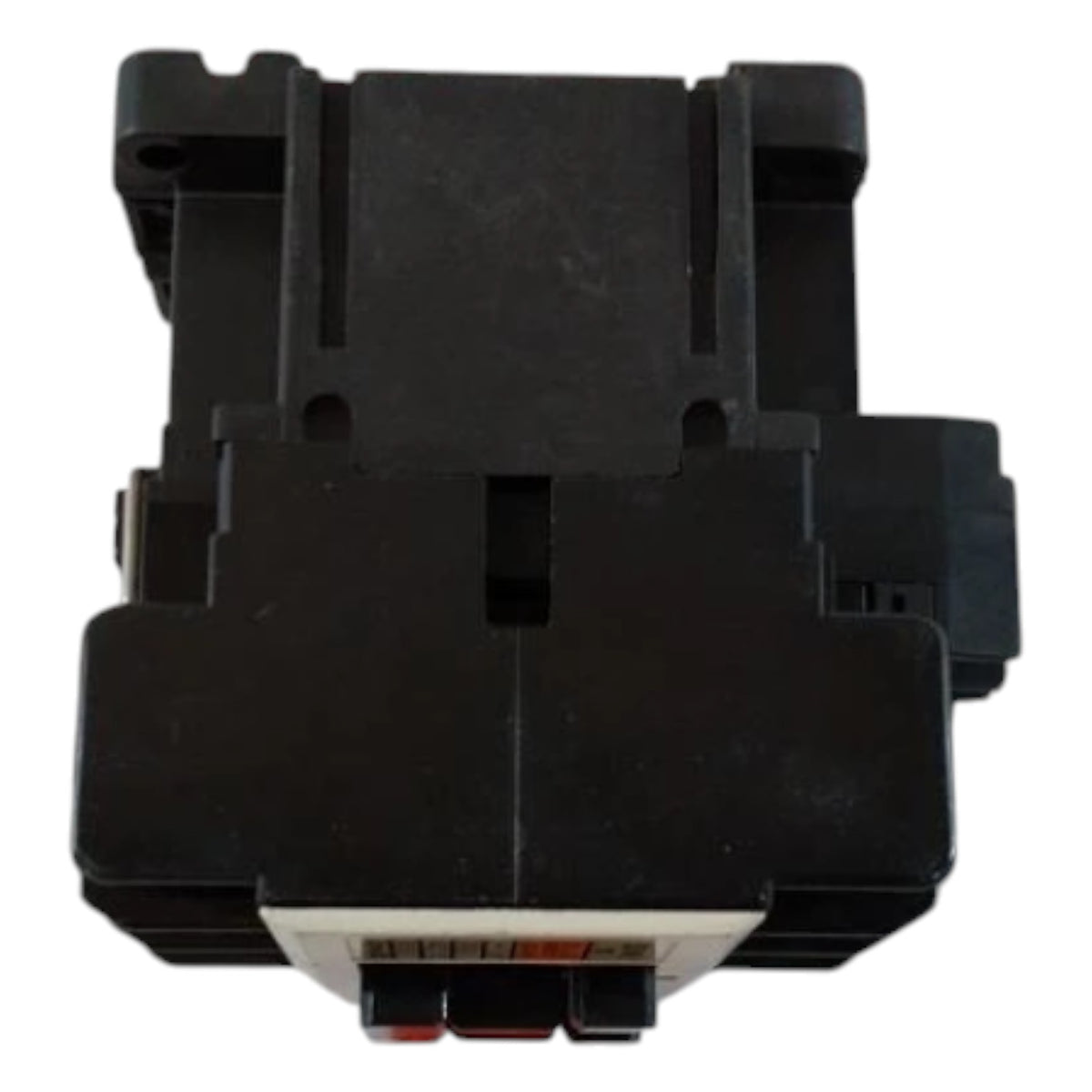Black plastic component on a white background