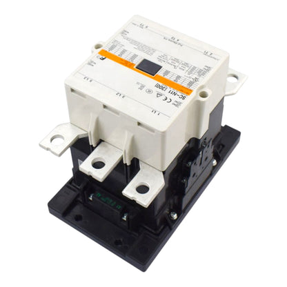 A Fuji electrical contactor with a white upper control module and a black lower base, featuring terminal blocks and a printed technical specification label.