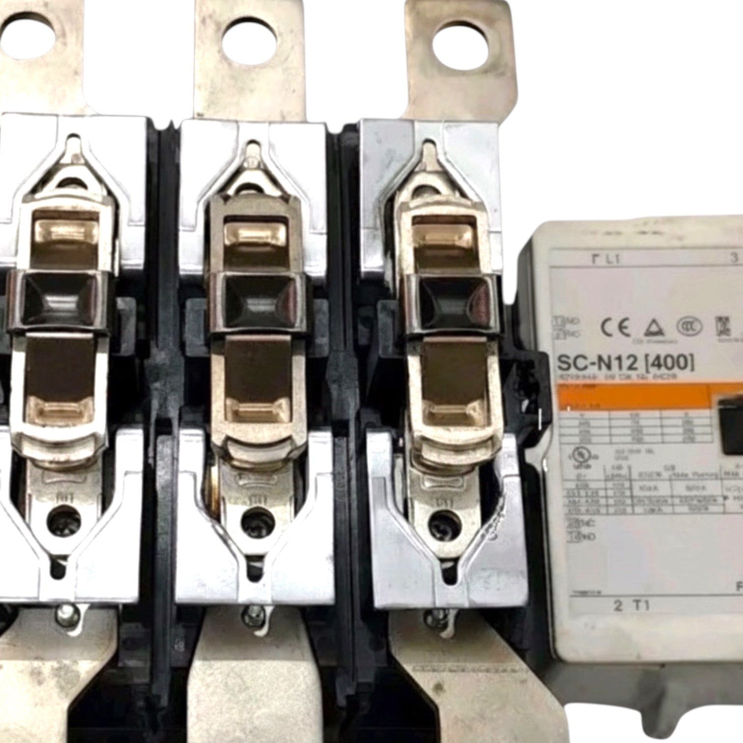 Three large industrial contactors with silver metal terminals and black plastic housings, shown next to a white molded electronic component labeled SC-N12 [400].
