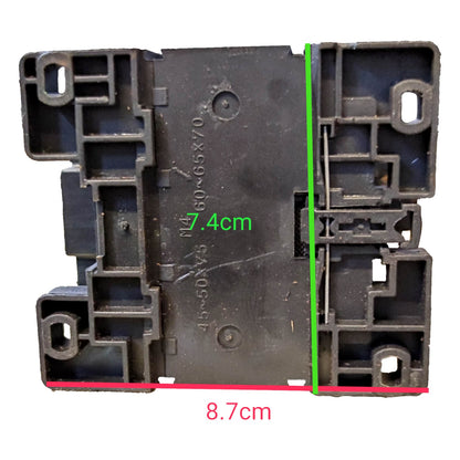 Black plastic component with measurements marked on a white background