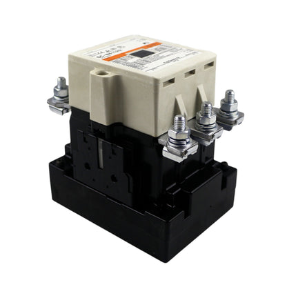 Electrical contactor with beige top and black base on a white background
