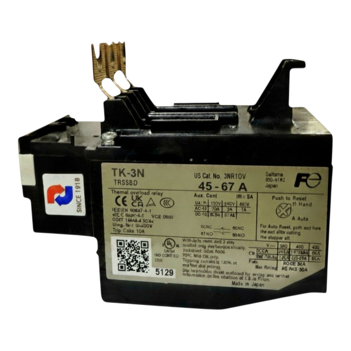 A TRSBBD TK-3N industrial contactor relay with a black plastic housing, a white technical specification label, and gold-toned metal terminals on top, photographed on a white background.