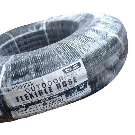 A large spool of FUJIPIPES outdoor flexible hose wrapped in clear protective plastic, with a white product label showing specifications and brand details.