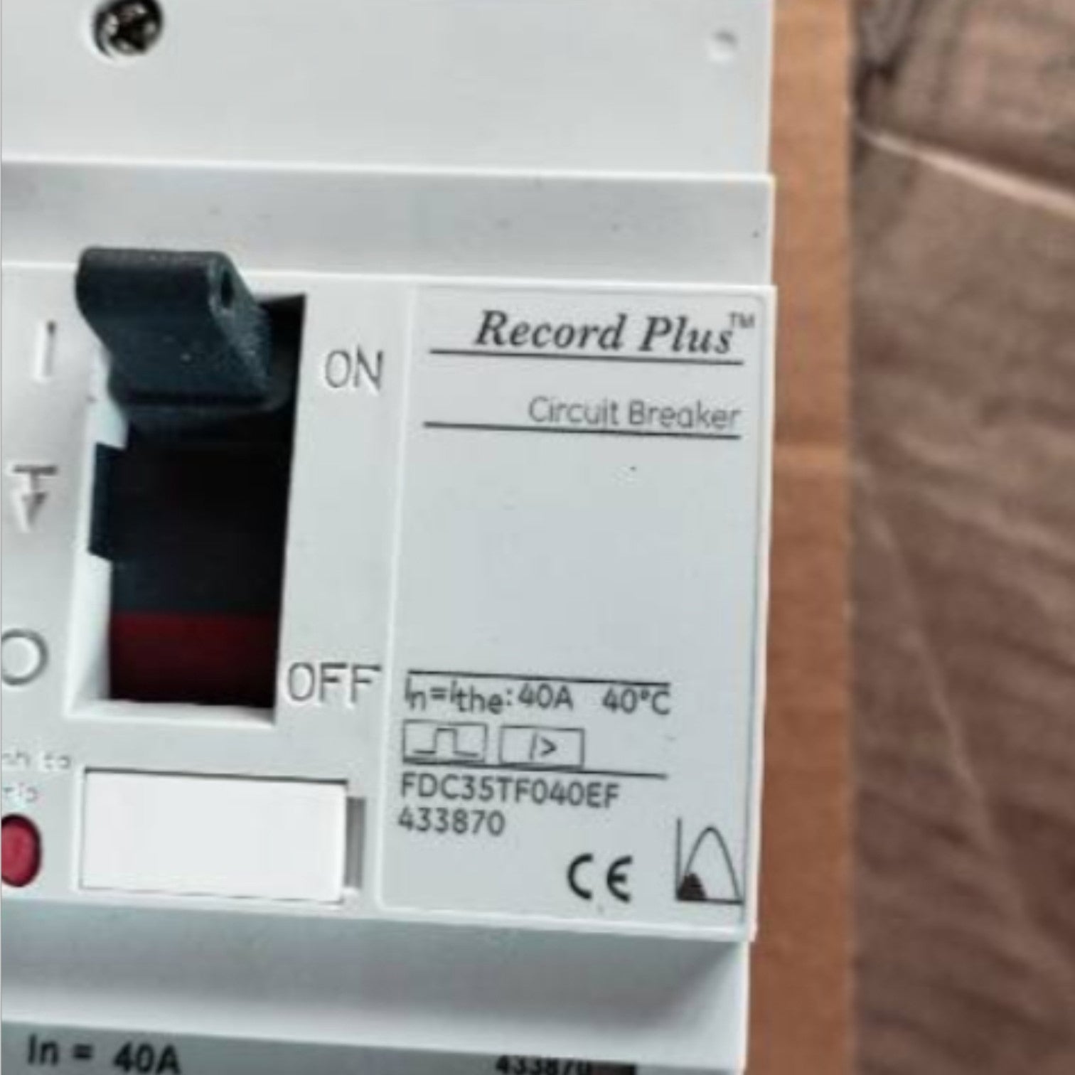 Record Plus circuit breaker switch on a wooden background GE 40A 3Pole 25KAIC 220V MCCB Industrial Circuit Breaker FD160 Electx Electrical Supply