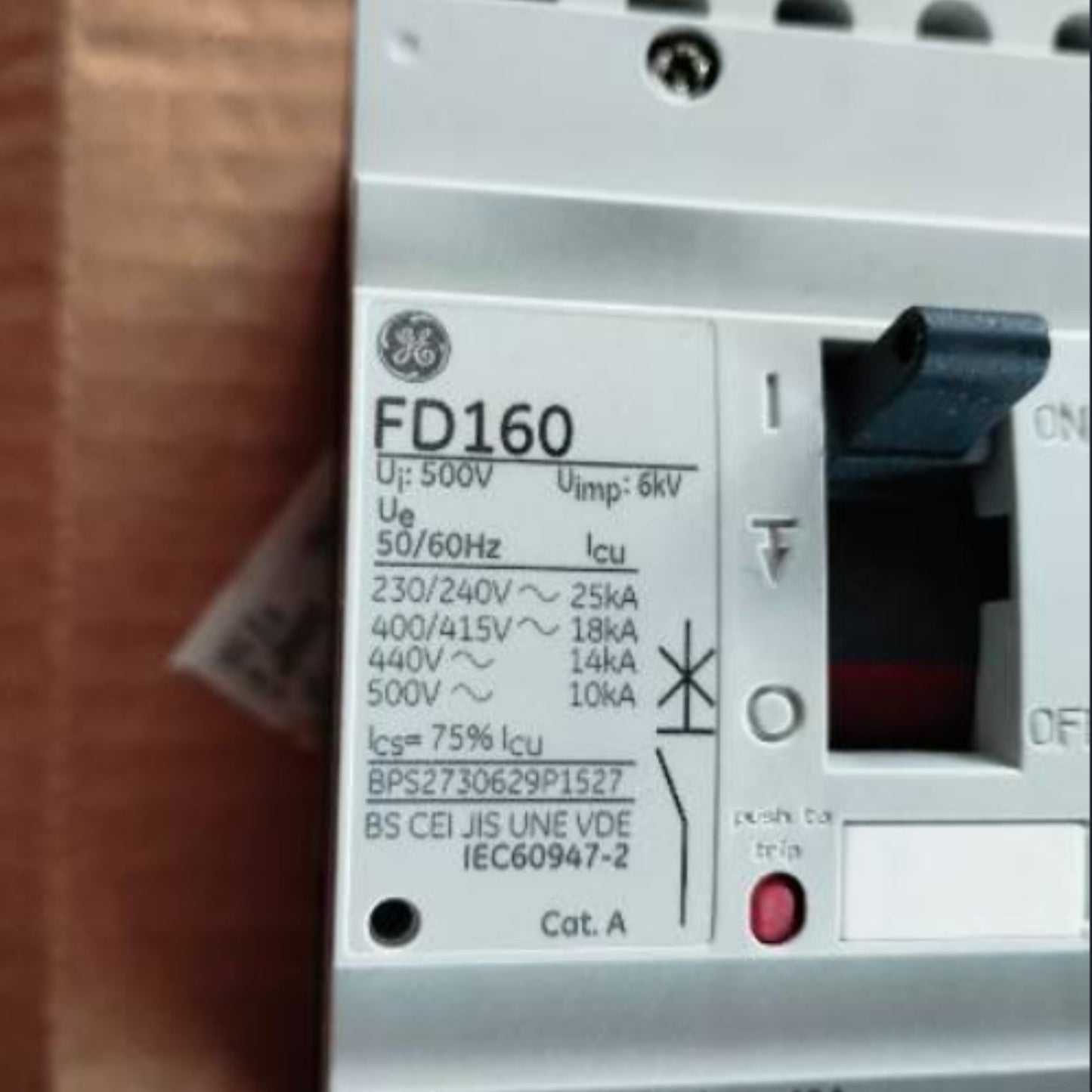 GE electrical breaker with model number FD160 on a wooden surface GE 40A 3Pole 25KAIC 220V MCCB Industrial Circuit Breaker FD160 Electx Electrical Supply
