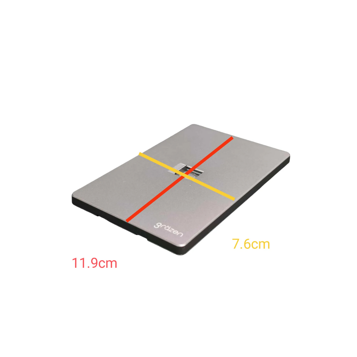 A rectangular gray measuring board with red and yellow crosshatched guide lines, shown on a white background with dimension labels '11.9cm' and '7.