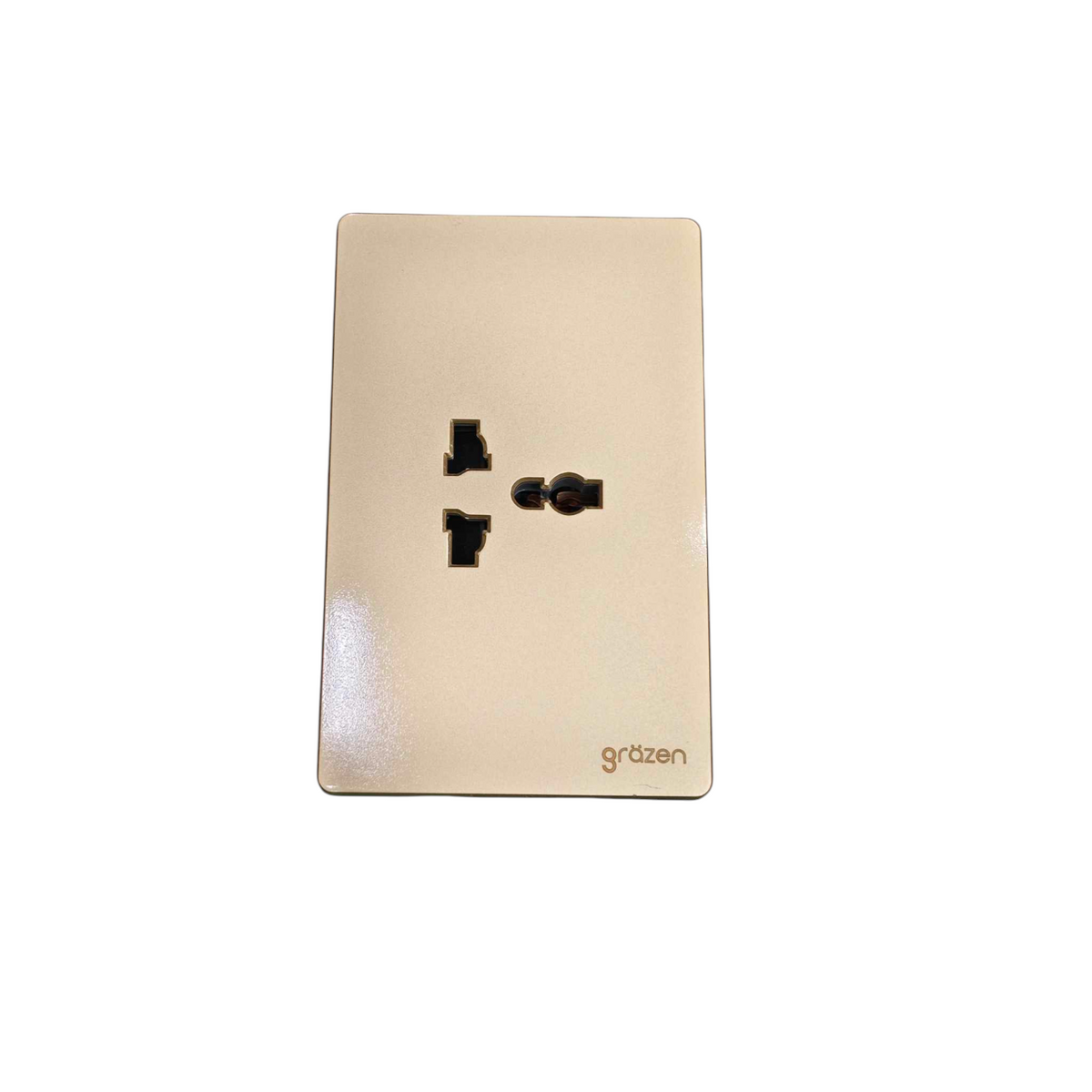 A single wall outlet cover plate in a warm champagne-gold finish, featuring black electrical sockets and the 'grézen' brand name printed in gold near the bottom right, set against a plain white background.