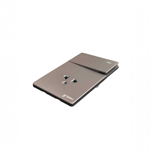 A modern wall switch panel with integrated power outlets, featuring a metallic taupe finish and the 'sdzoon' brand name printed near the bottom.