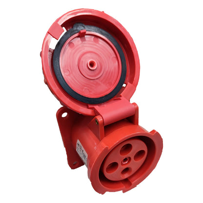 Red electrical plug on a white background
