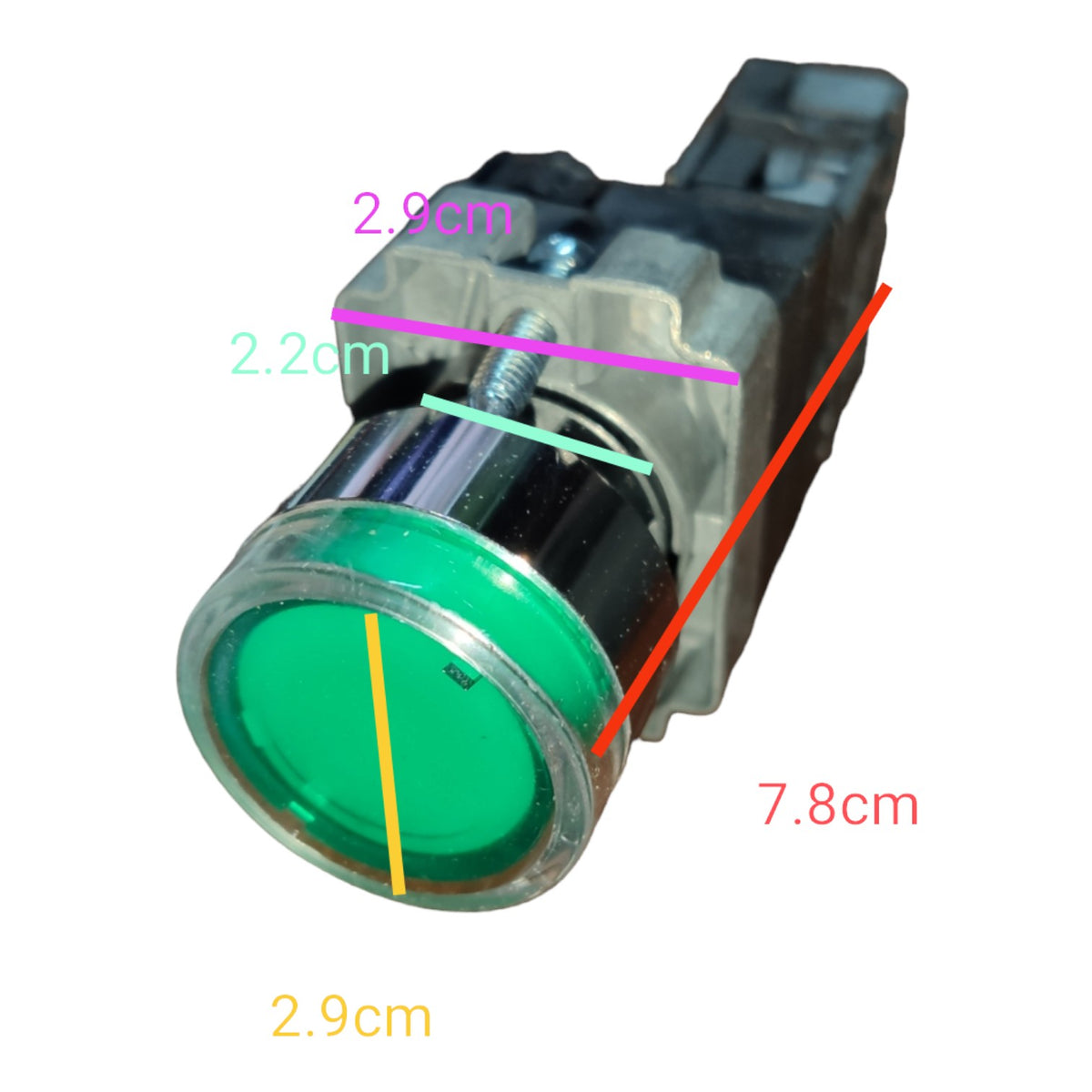 A small industrial-style round green button or switch with overlaid dimension lines and measurements (2.9 cm, 2.