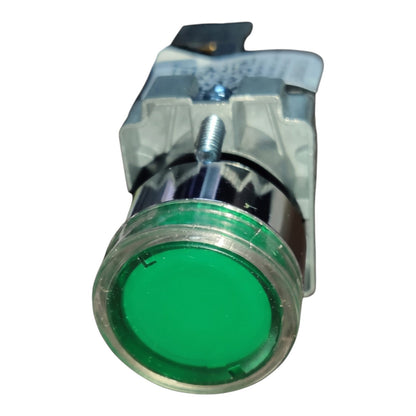A green push-button switch with a clear plastic housing and a silver metal terminal, shown against a plain white background.