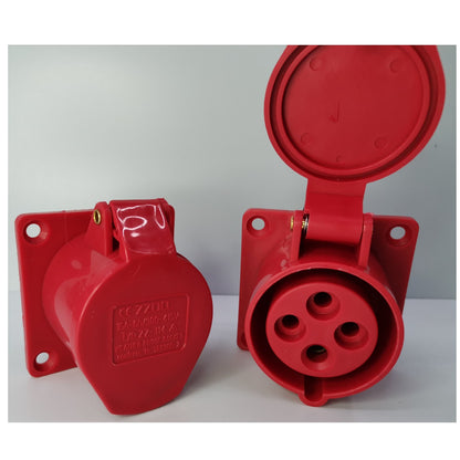 Two red electrical connectors on a white background