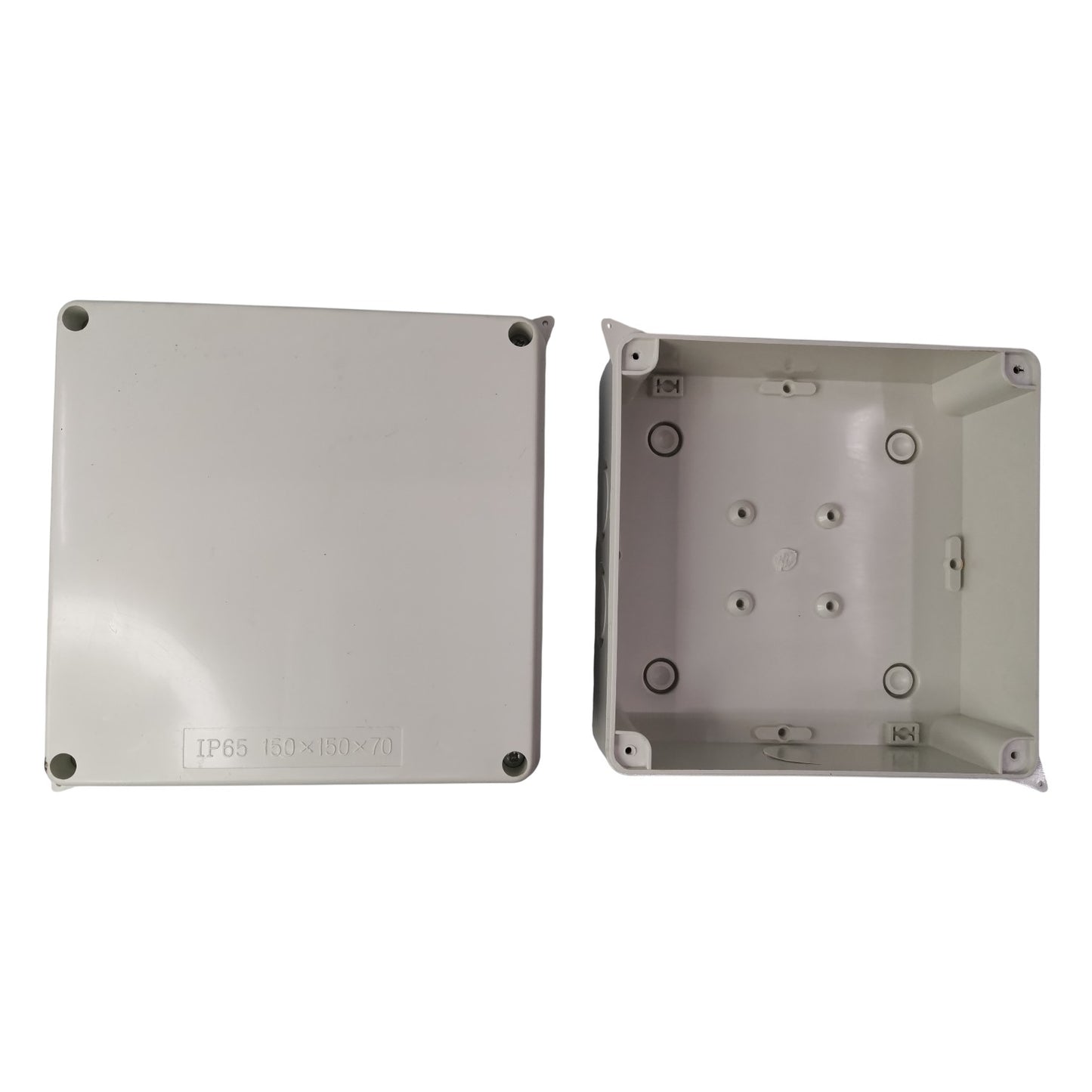 Two metallic boxes with screws on a white background