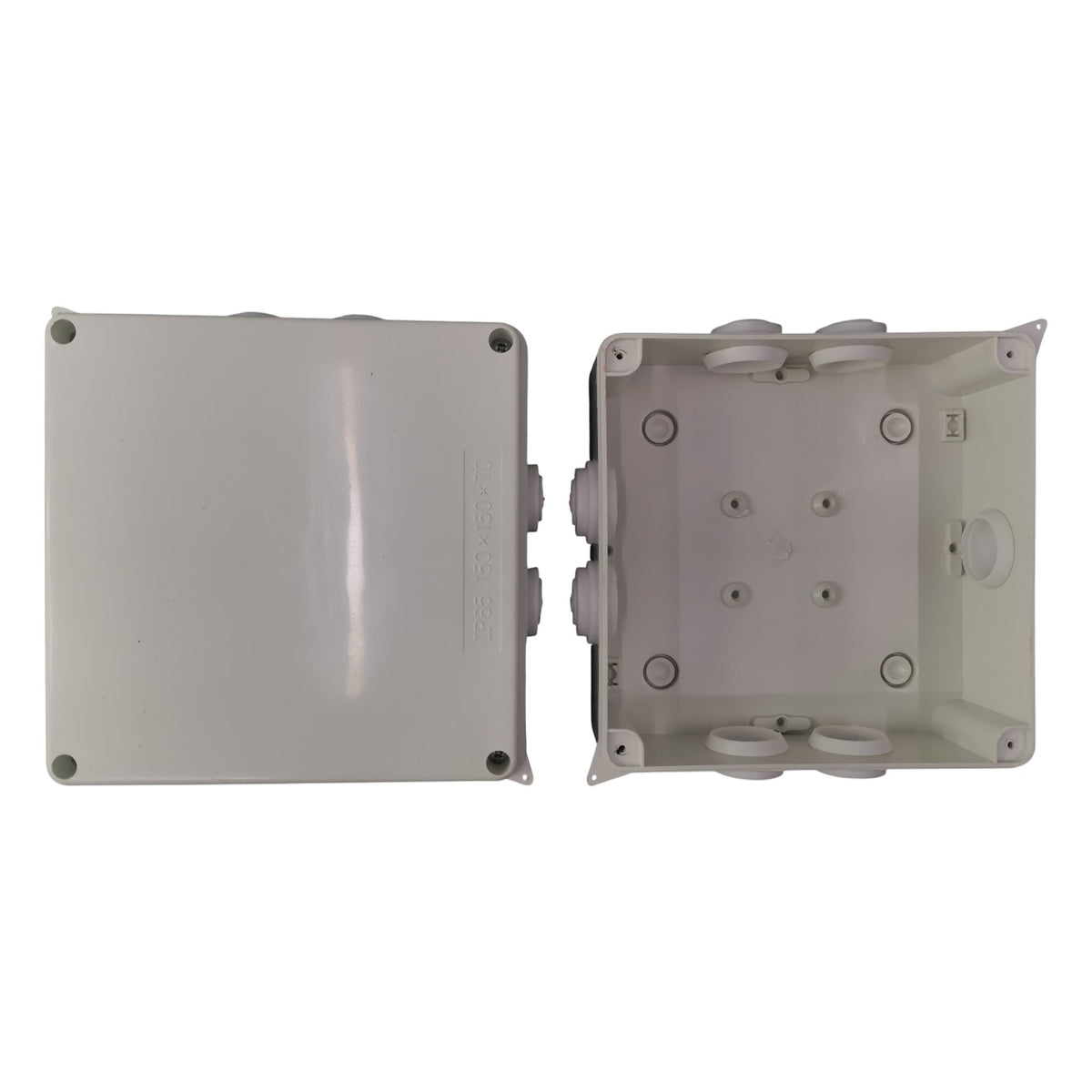 Two gray plastic junction boxes on a white background