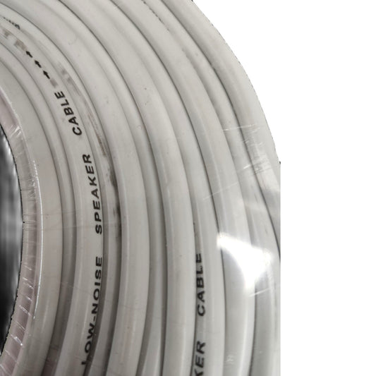 A close-up of a coiled white speaker cable wrapped in clear protective plastic, with black printed text reading 'LOW-NOISE SPEAKER CABLE'.
