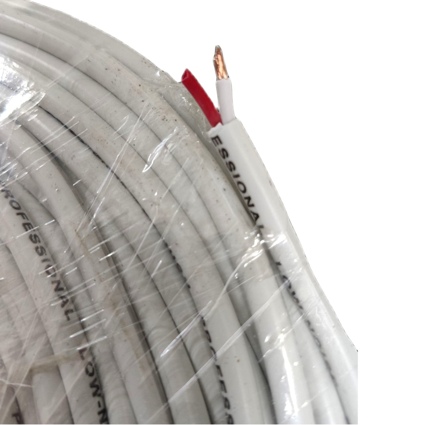White multi-core cable wrapped in clear protective plastic, with one end stripped to show a red inner layer and a copper-colored outer conductor. The cable has black printed text on the white jacket.