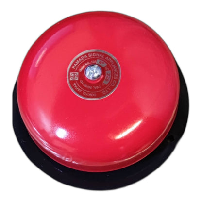 A red emergency signal bell with a black base, featuring a central metal label that reads 'HAMADA SIGNAL AIRLIFT CO., LTD.