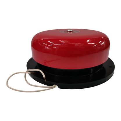 Red fire alarm bell with black base on a white background