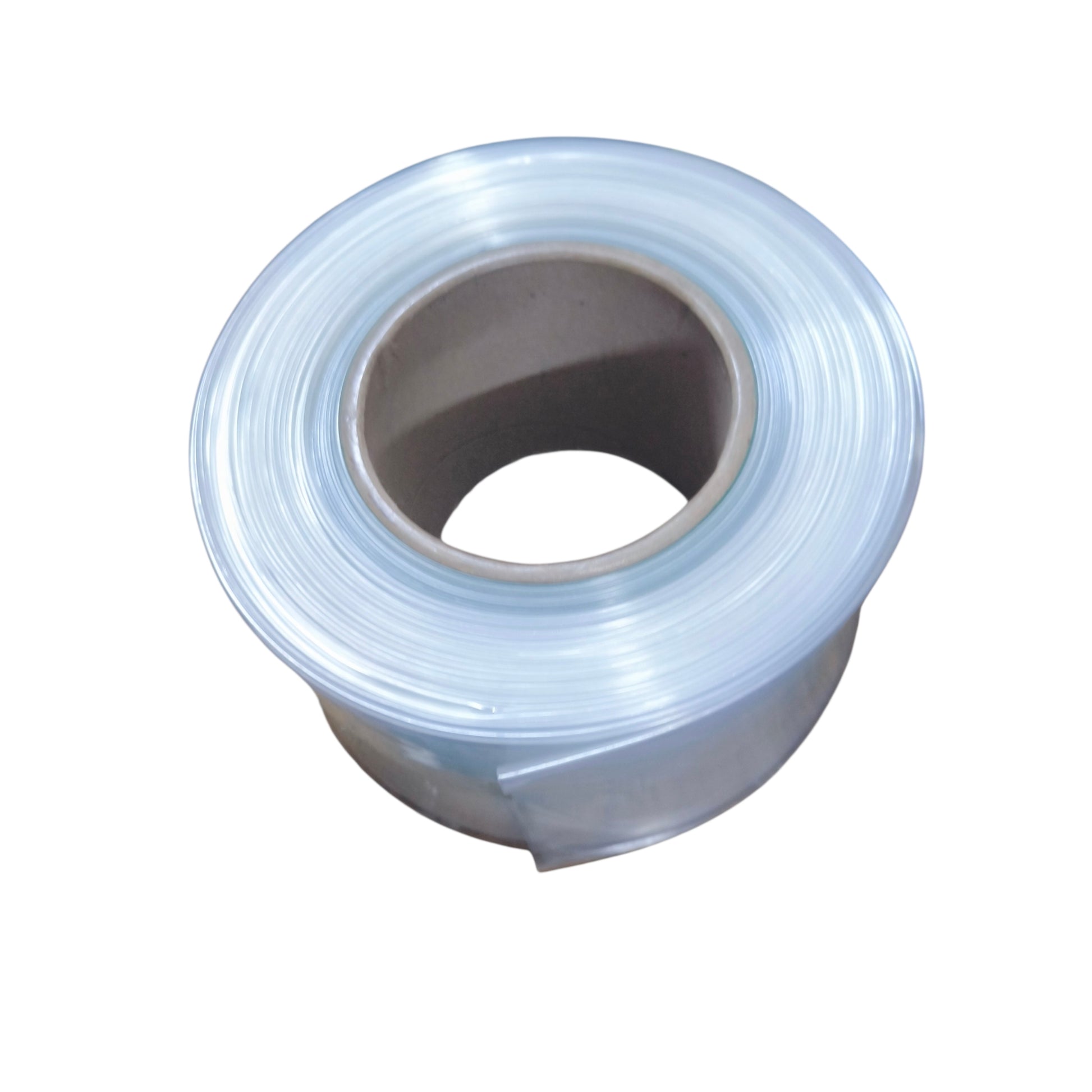 Roll of clear tape on a white background