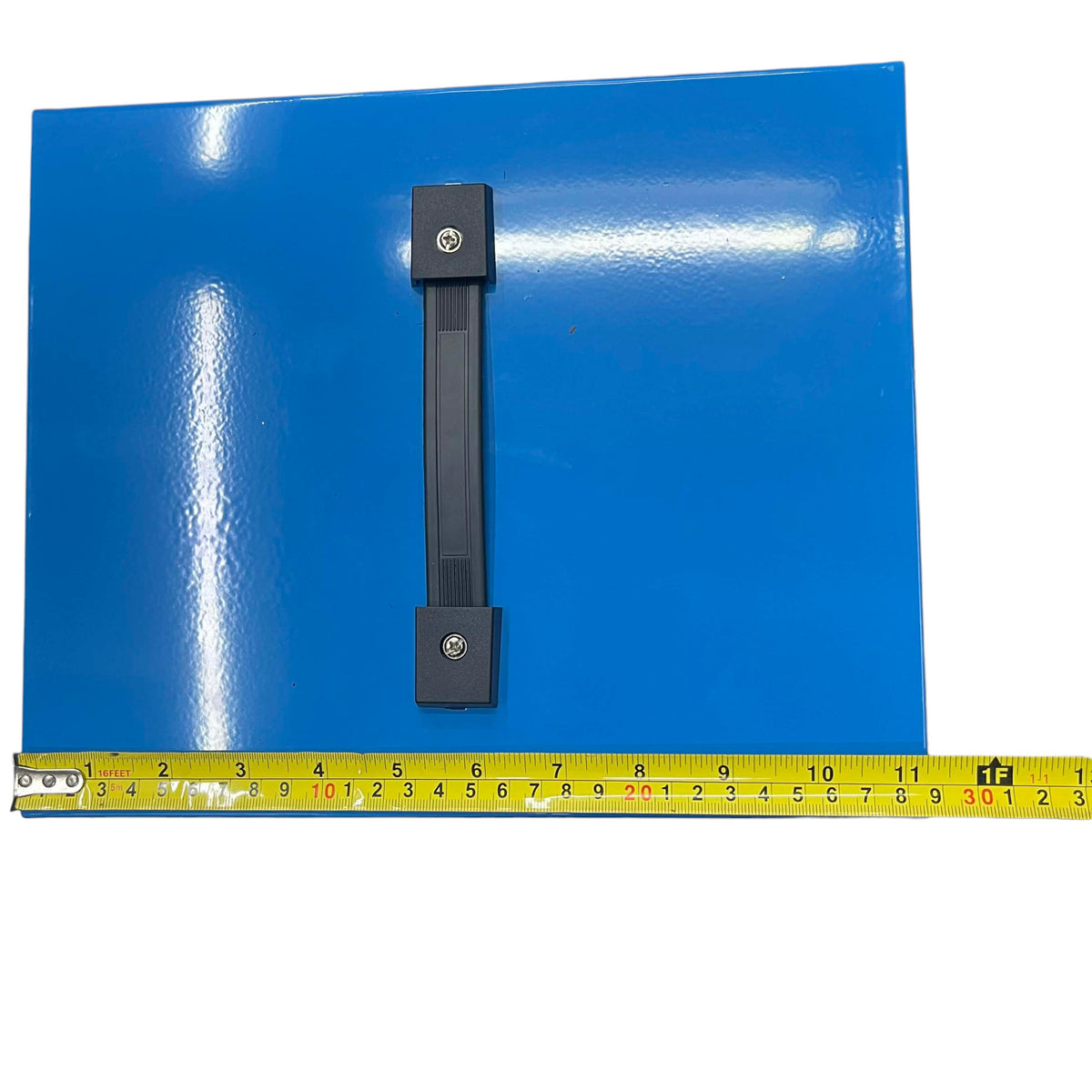 Blue sheet with a black metal bracket on a white background, featuring a yellow measuring tape for scale.