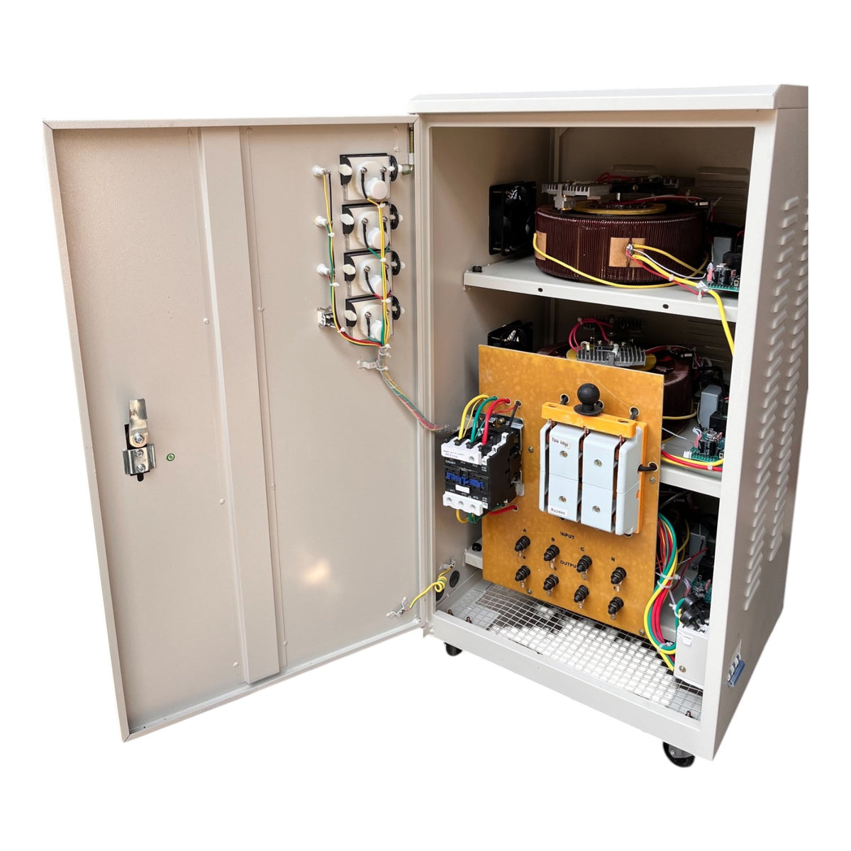 An open industrial electrical control cabinet showing internal components including transformers, wiring, and control modules, photographed on a white background.
