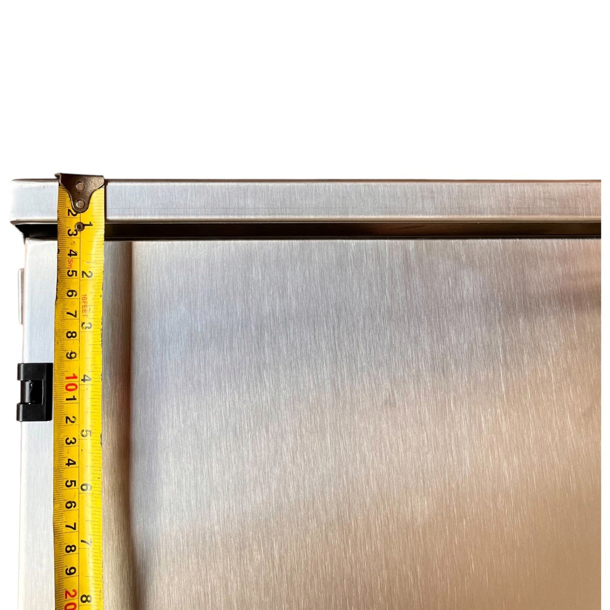 Corner of the NEMA 4X stainless steel panel housing for Himel 500A MCCB with tape measure showing dimensions.