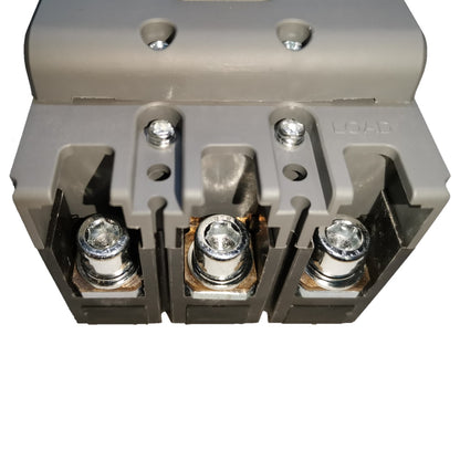 A close-up of a gray electrical terminal block connector with three metal screw terminals visible on a white background.