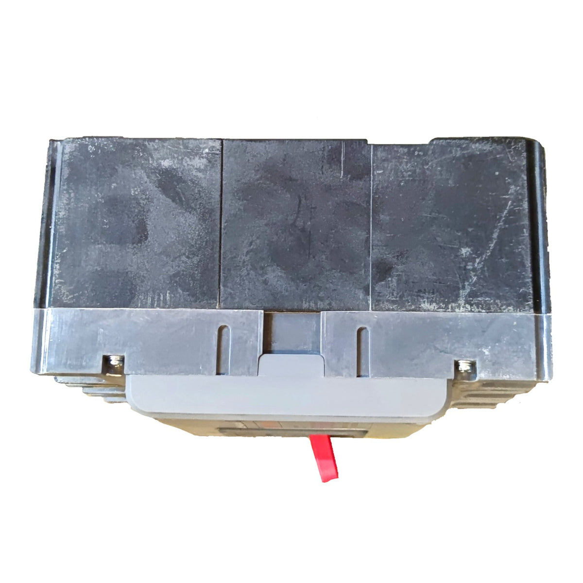 A used black plastic automotive battery terminal cover or protective cap with a gray metal base and a small red tab, shown against a plain white background.