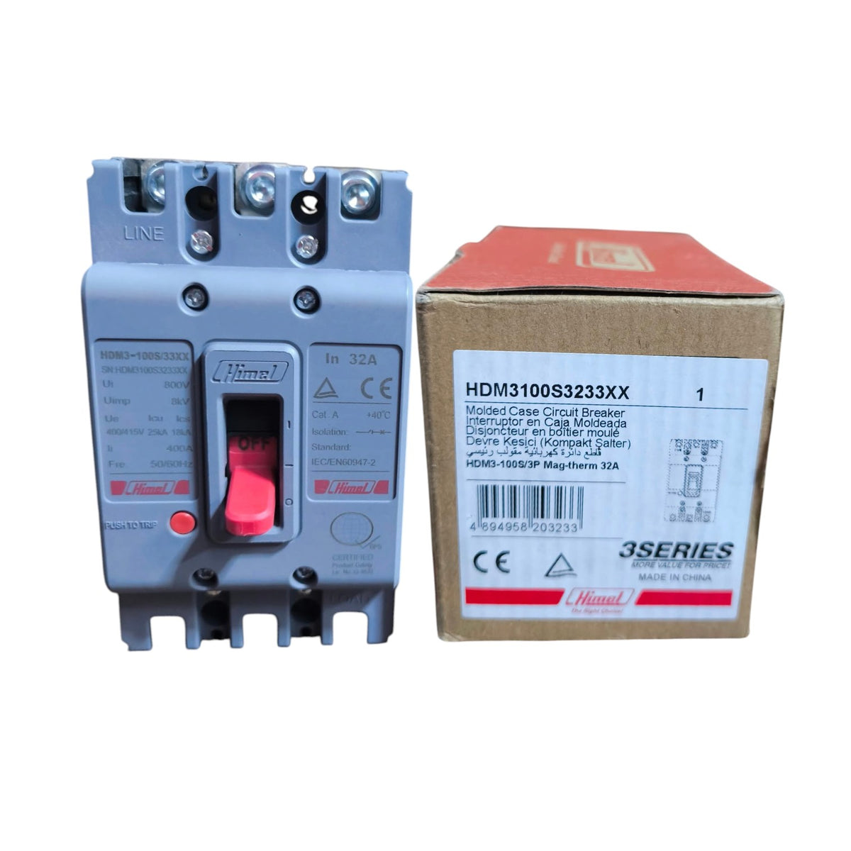 A Hamel 3-phase circuit breaker in gray plastic with a red switch handle, shown next to its original cardboard packaging box on a white background.