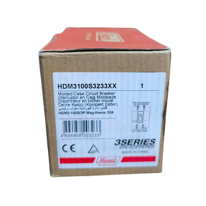 A cardboard box for a molded case circuit breaker, labeled HDM3100S3233XX, with a white front label and red top flap, photographed on a plain white background.