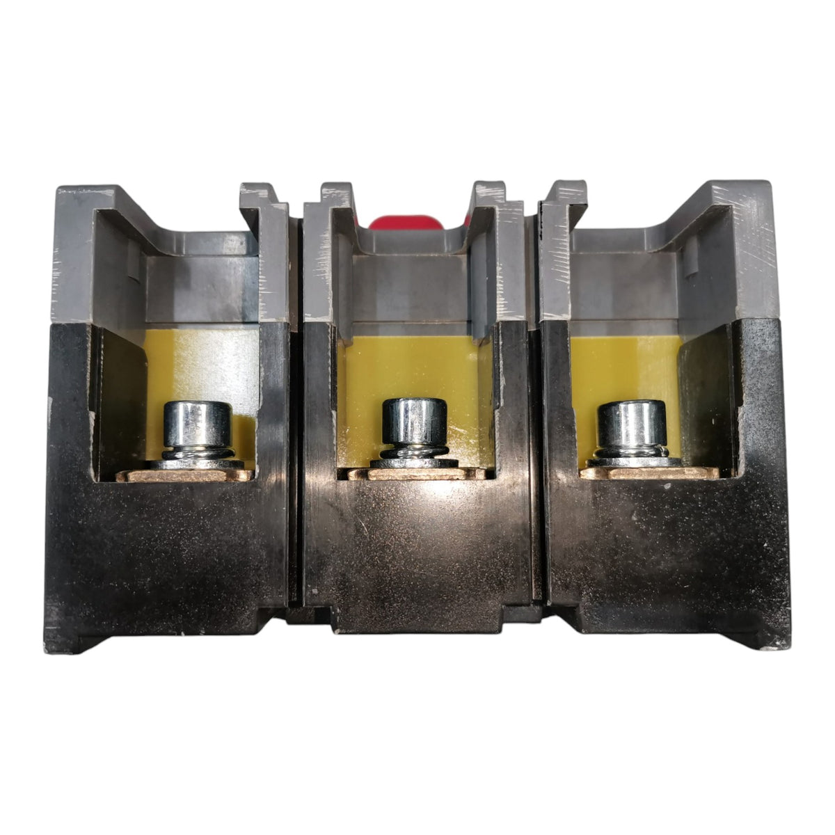 A three-phase electrical terminal block connector with black and gray metal housings, yellow insulating material, and silver screw terminals, shown on a white background.