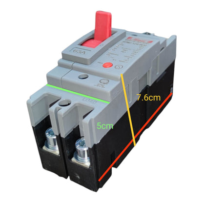 A gray and black electrical circuit breaker with a red handle, shown on a white background with overlaid dimension lines and text indicating 7.6cm and 5cm measurements.