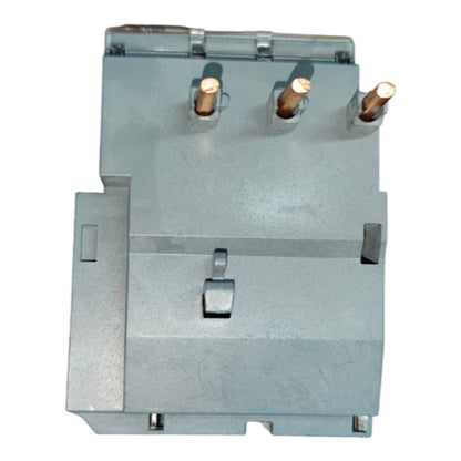 A silver metal electrical component or terminal block with three copper-colored pins on top, shown against a plain white background.