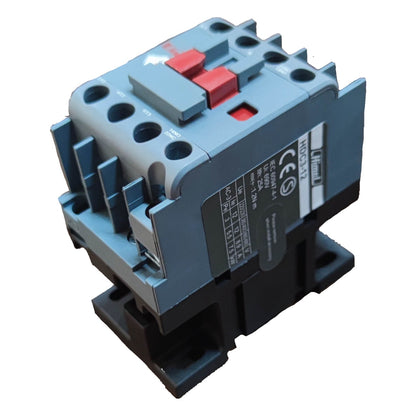 Electrical contactor with red buttons on a white background