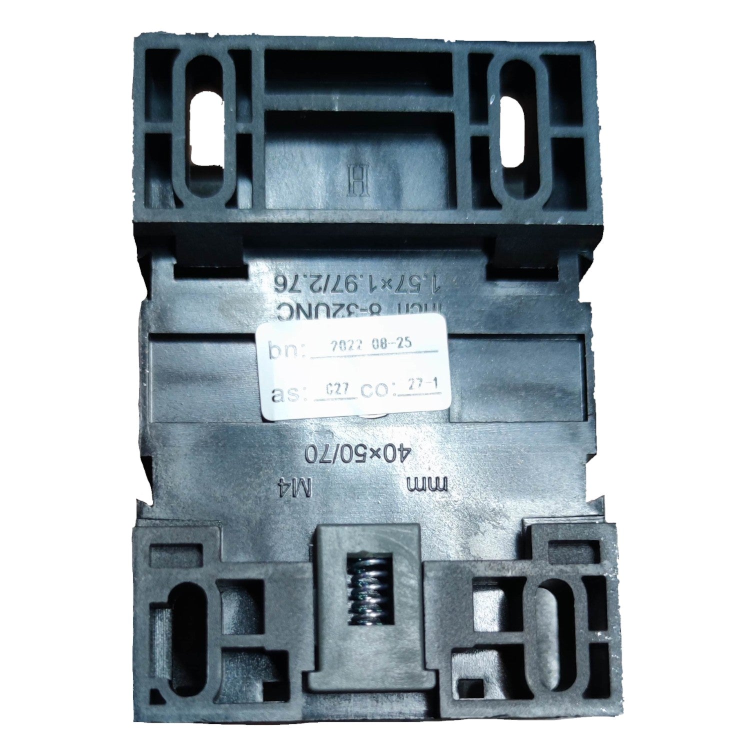 Stack of black plastic components with measurement labels on a white background